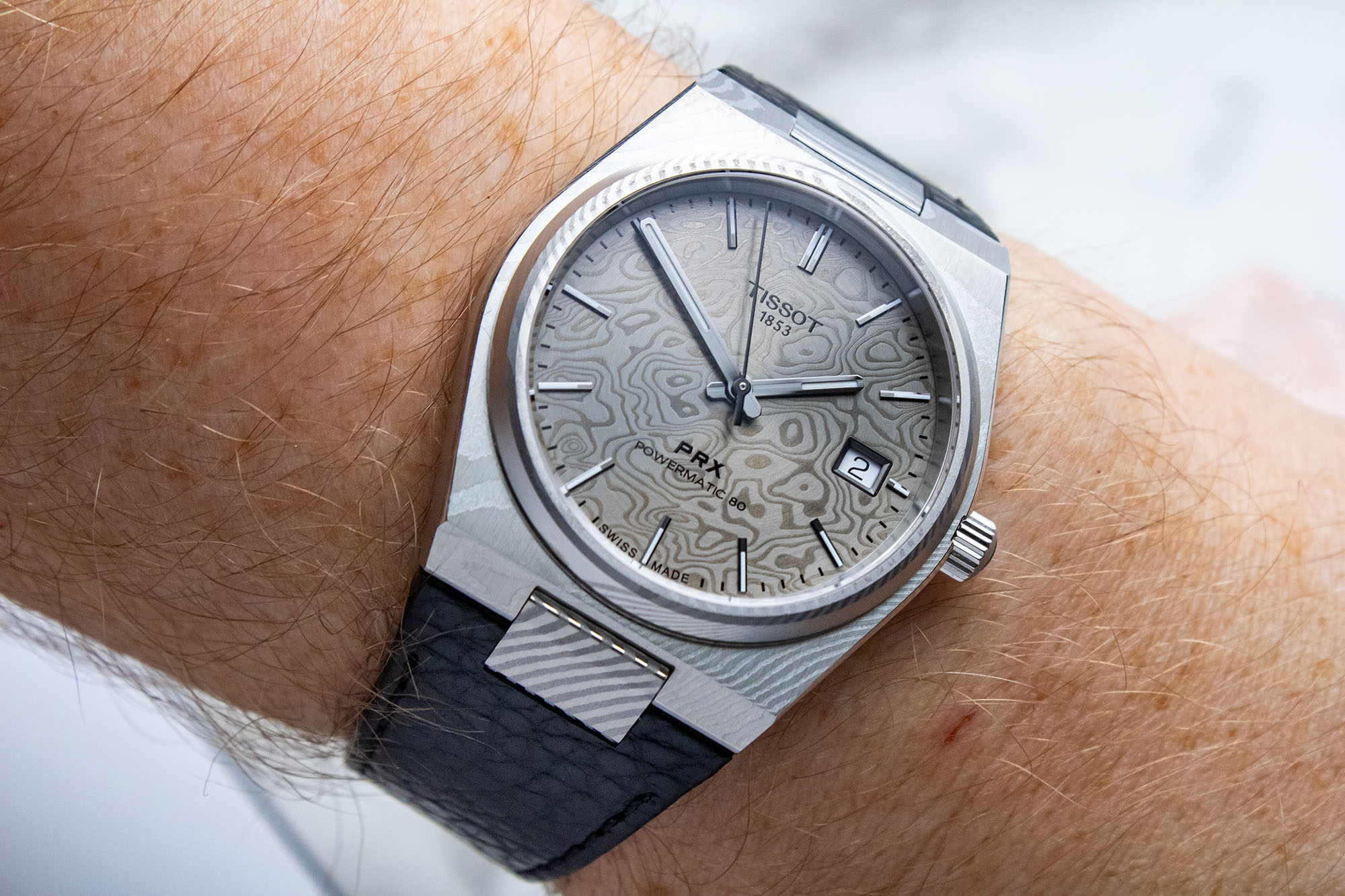 Tissot PRX Powermatic 80 Damascus (38mm): Real Damascus Steel Meets the PRX Sweet Spot
